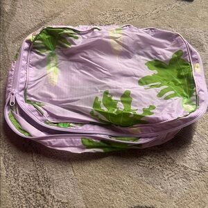 BAGGU daikon packing cube medium size pink and green
